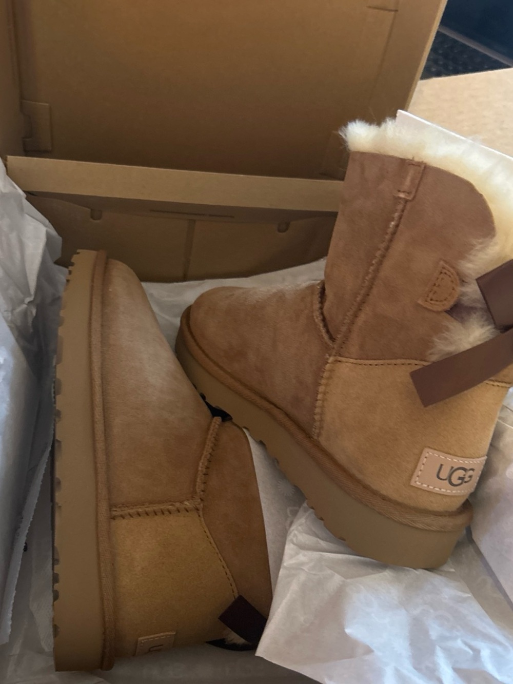 UGG Women's Short Chestnut Suede Shearling Boot with Back Bow